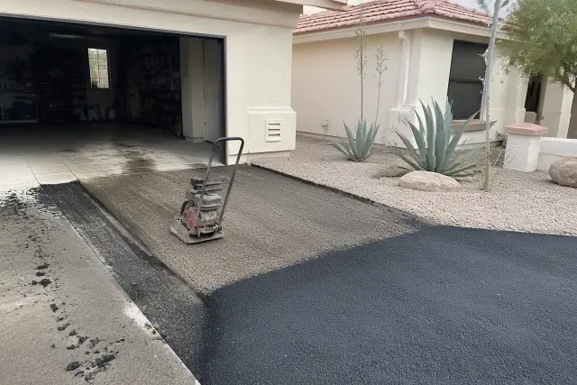 Milled asphalt surface prepared for base repair and resurfacing.