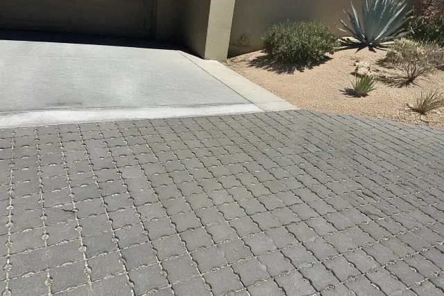 Permeable pavers and asphalt driveway transition at a residential home in Tempe, AZ.