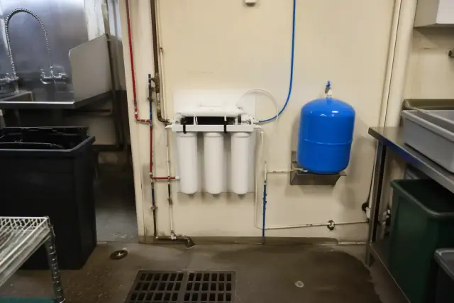 Reverse osmosis water filtration system installed in a restaurant utility room in Tempe, AZ.