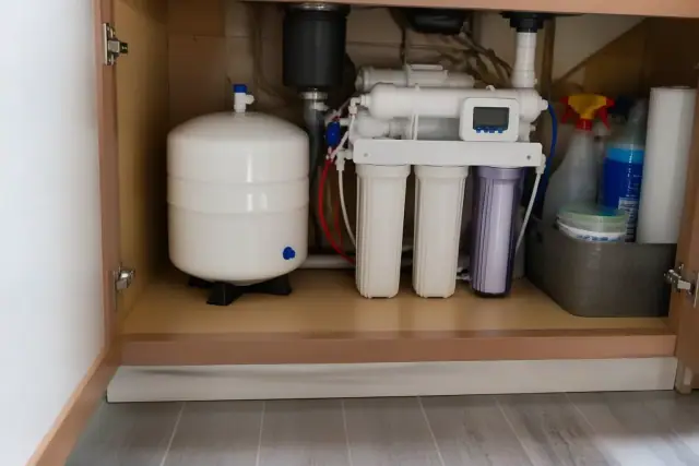 Reverse osmosis system installed under a kitchen sink cabinet in Tempe, AZ.