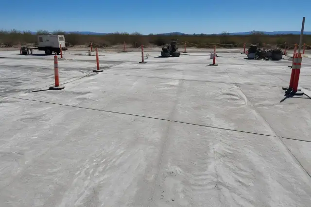 Industrial concrete floor with safety markings prepared for an epoxy coating at a job site in South Tucson, AZ.