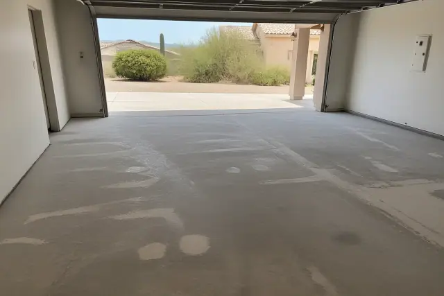 Concrete floor prepped for an epoxy finish in a residential garage in Green Valley, AZ.