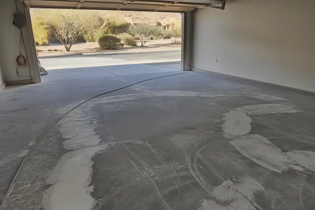 Concrete floor prepared for epoxy resurfacing in a residential garage in Catalina Foothills, AZ.