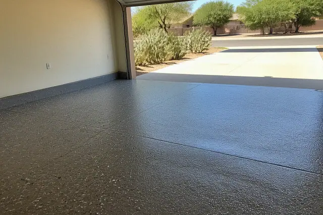 Two-car residential garage with flake epoxy flooring and desert views in Tucson, AZ.