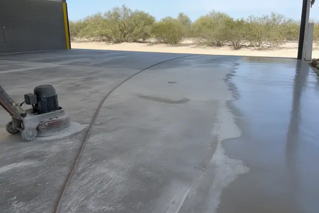 Industrial epoxy flooring preparation on a warehouse loading dock in South Tucson, AZ.