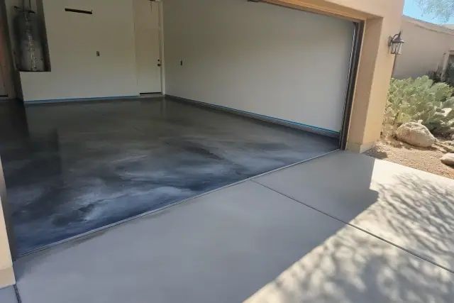 Metallic epoxy garage floor with a marbleized resin finish in a residential home in Tucson, AZ.