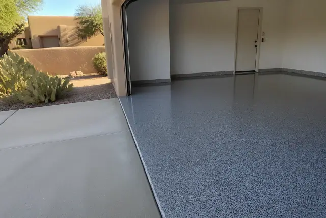 A high-gloss flake polyaspartic floor finish in a residential garage in Casas Adobes, AZ.