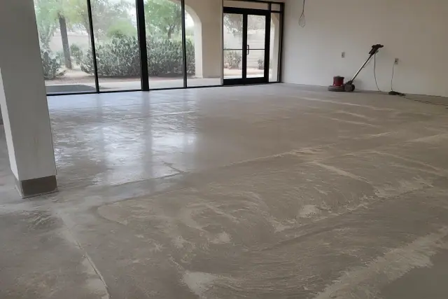 Sanded concrete floor in a commercial space prepared for epoxy installation in Tucson, AZ.