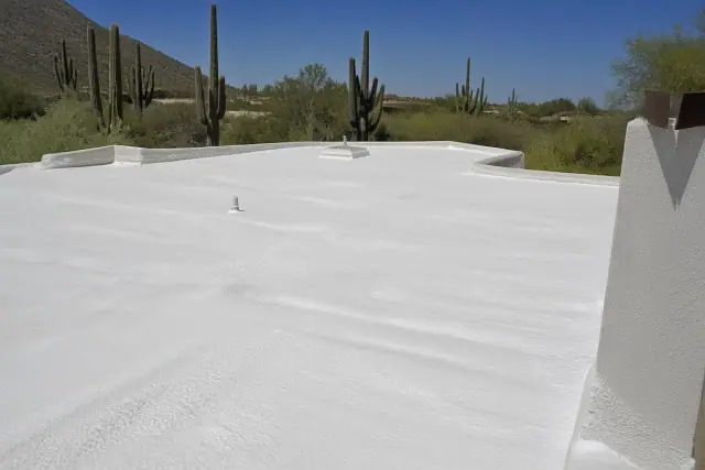 Acrylic elastomeric coating on a textured foam roof in the Sonoran Desert, Tucson, AZ.