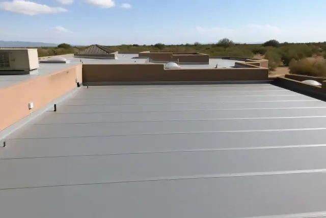 Finished heat-welded membrane roofing on a commercial building in Flowing Wells, AZ.