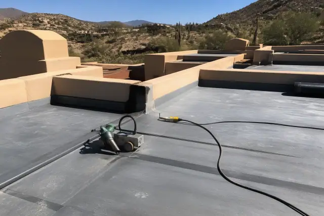 Professional heat-welded roofing installation on a commercial building in Catalina Foothills, AZ.