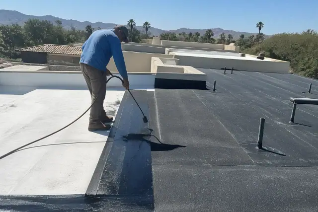 Heat-welded seams on a commercial roof membrane during repairs in Tucson, AZ.