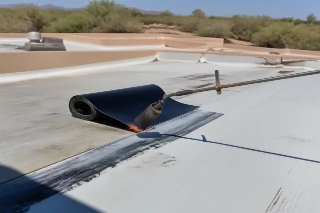 Heat-welded seam repair on a commercial flat roof in Green Valley, AZ.