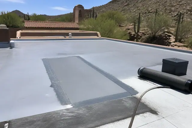 Heat-welded flat roof repair with fresh membrane and sealant on a commercial building in Catalina Foothills, AZ.