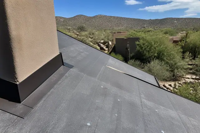 Installed underlayment and flashing on a residential roof deck in the Tucson, AZ foothills.