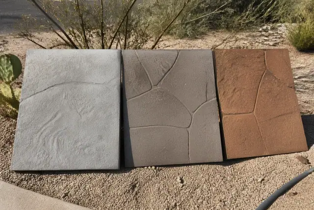 Broom, stamped, and colored concrete finish samples displayed on a desert jobsite in Tucson, AZ.