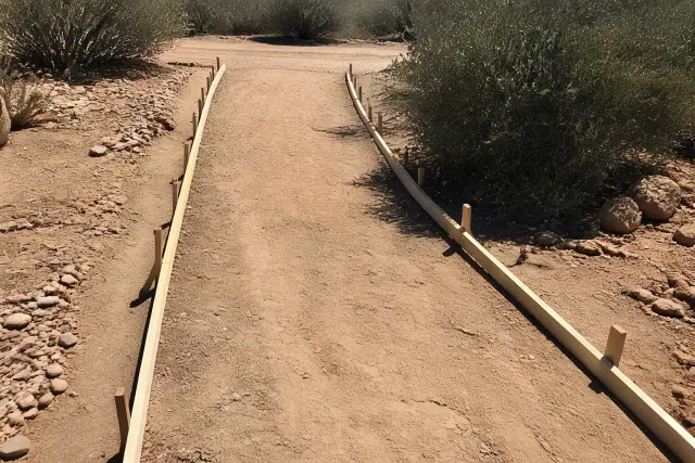 Wooden forms set for a new concrete sidewalk installation in Green Valley, AZ.