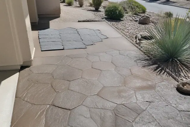 Stamped concrete patterns and surface textures being imprinted at a jobsite in Tucson, AZ.